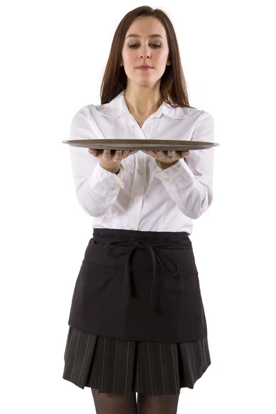 Joven camarera sosteniendo en blanco — Foto de Stock