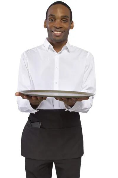 Garçom masculino carregando uma bandeja em branco — Fotografia de Stock