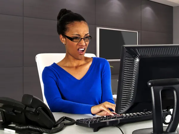 Businesswoman with computer — Stock Photo, Image