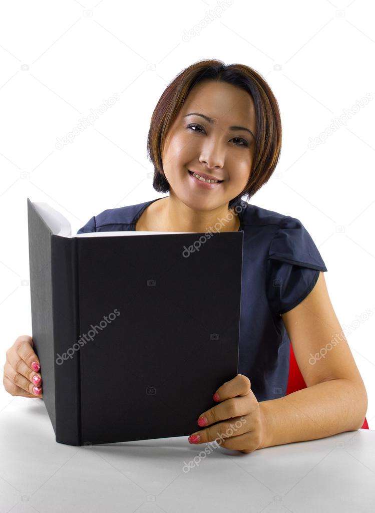 female studying with text book