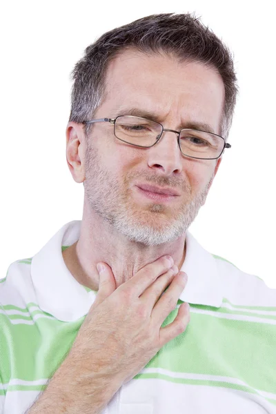 Male holding painful throat and frowning — Stock Photo, Image