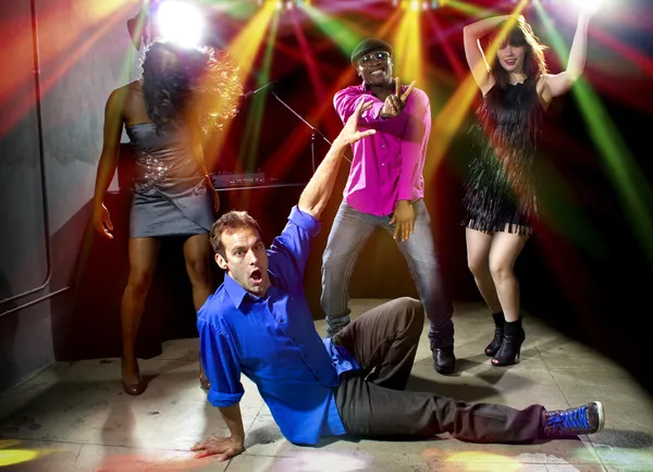 Caucasian man falls in dance club — Stock Photo, Image