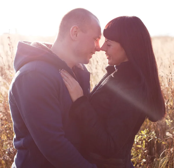 Couple in love walking outdoors — Stock Photo, Image