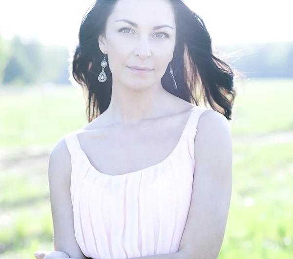 Woman in pink dress  outdoors — Stock Photo, Image