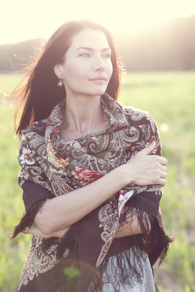 Woman in scarf outdoors — Stock Photo, Image