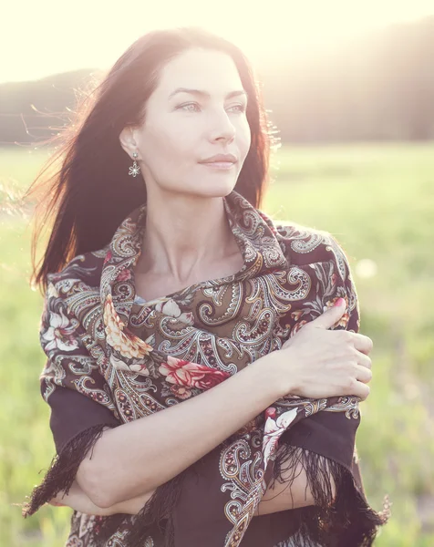Woman in scarf outdoors — Stock Photo, Image