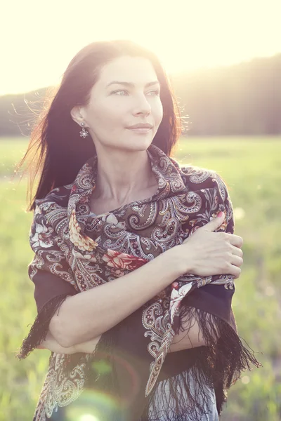 Woman in scarf outdoors — Stock Photo, Image