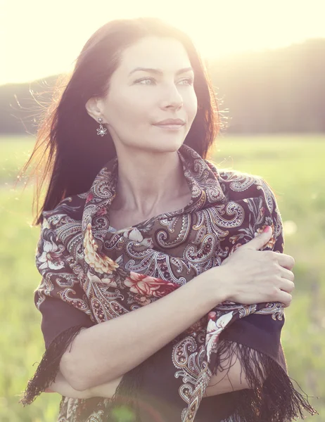 Woman in scarf outdoors — Stock Photo, Image