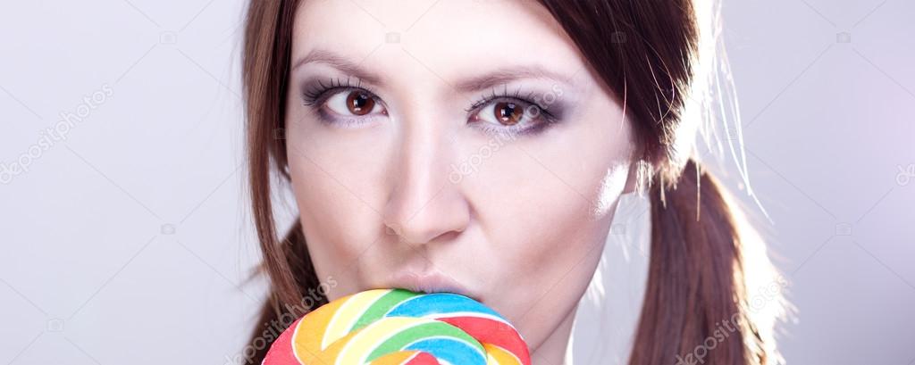 Girl sucks big candy