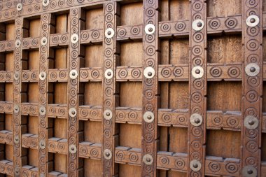 Traditional wooden door in Timbuktu. clipart