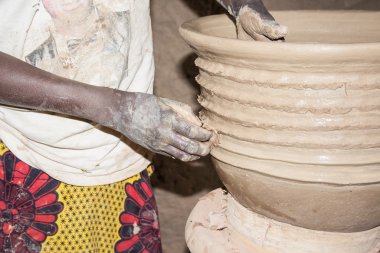 Hands of an artisan at working, Kalabougou, Mali, Africa. clipart