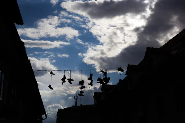 Shoes hanging on power lines, Ljubljana, Slovenia — Stock Photo, Image