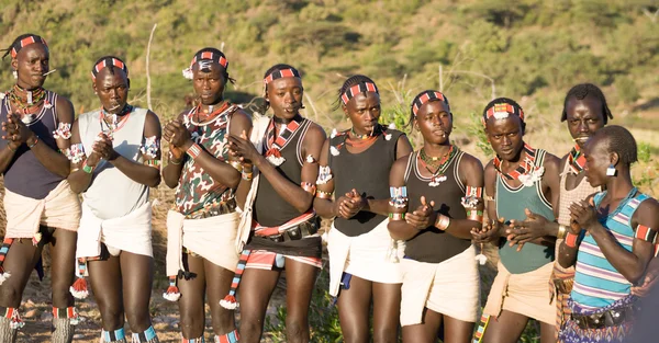 Boys wearing traditional costumes and dancing in the bull jumpin — Stock Photo, Image