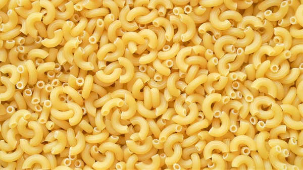 Uncooked Elbow Macaroni Pasta Background — Stock Photo, Image