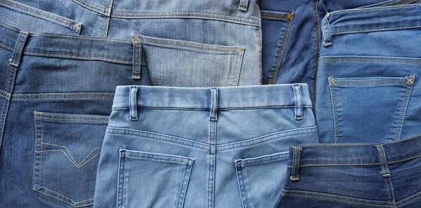 Various Blue Shades Sizes Pairs Denim Jeans Back Side — Zdjęcie stockowe