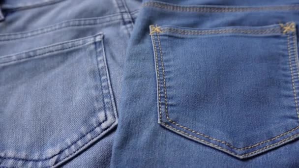 Close Shot Different Shades Blue Denim Jeans Back Pockets — Stockvideo