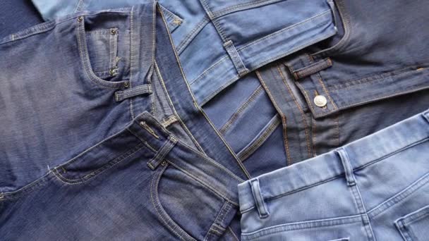 Slow Pan Shot Pairs Denim Jeans Various Blue Shades Sizes — Video Stock