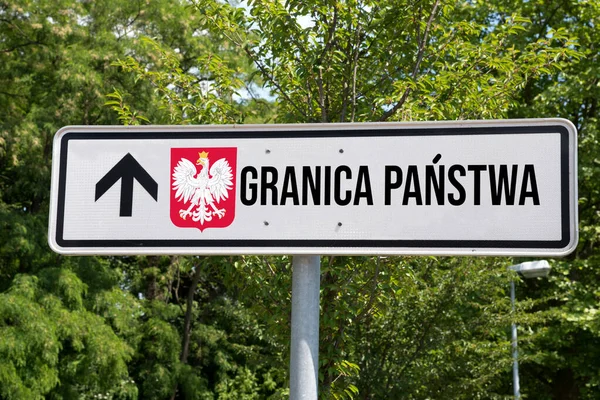 A sign saying the border with Poland