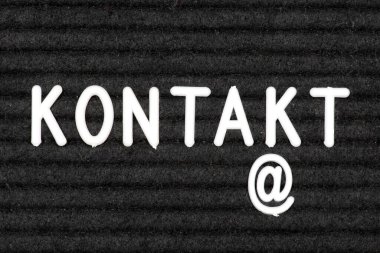 A chalkboard and the word Contact