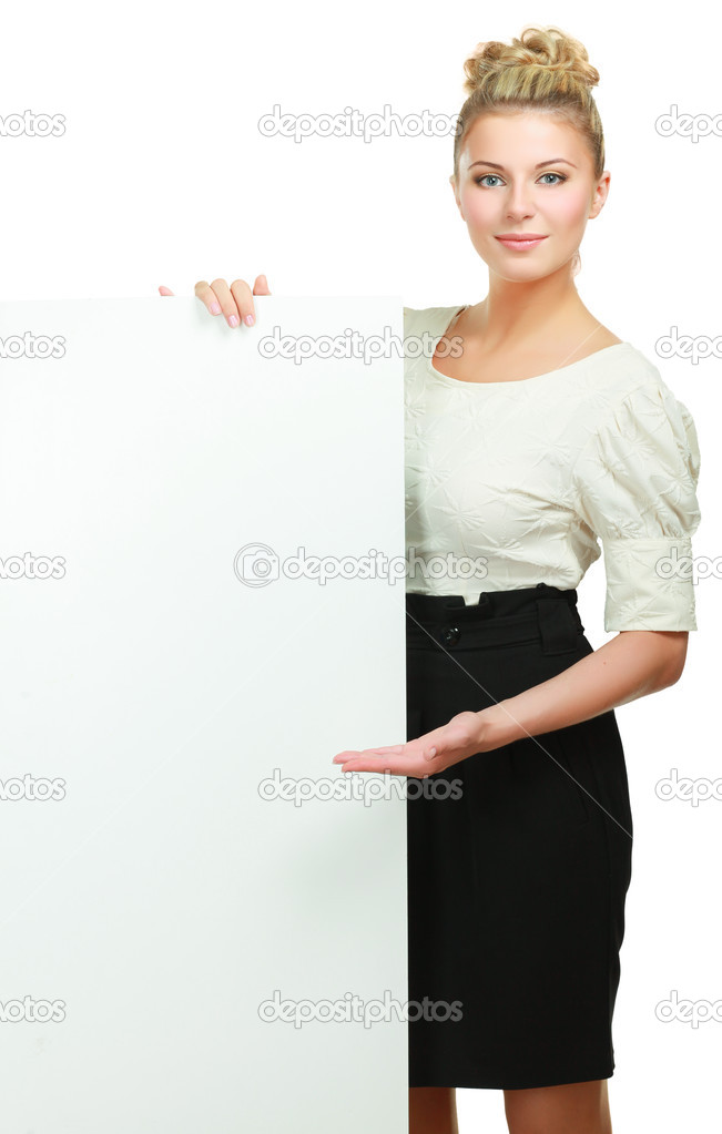 Portrait of a casual young woman holding blank card