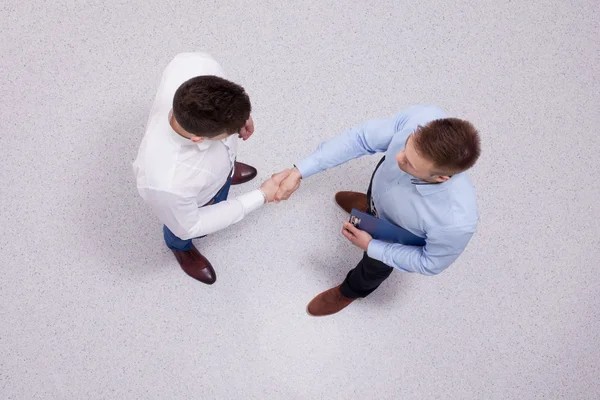 Overhead-Ansicht von Personen, die Geschäftstreffen haben, isoliert auf weißem Hintergrund — Stockfoto