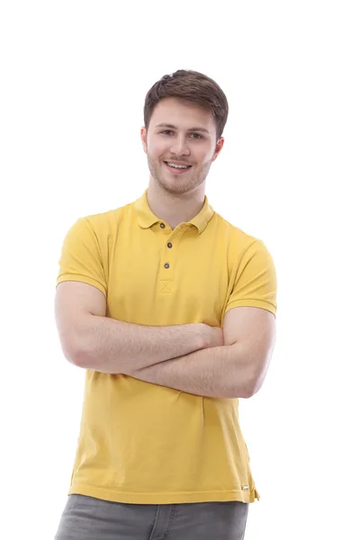 Jonge man die met gevouwen armen, geïsoleerd op witte achtergrond — Stockfoto