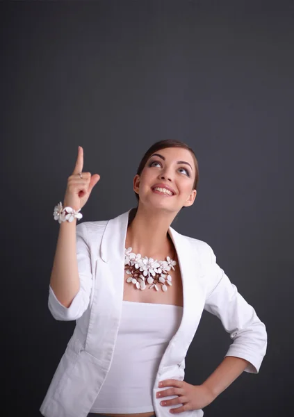 Portrait of young woman with beads, isolated on grey background — Stock Photo, Image