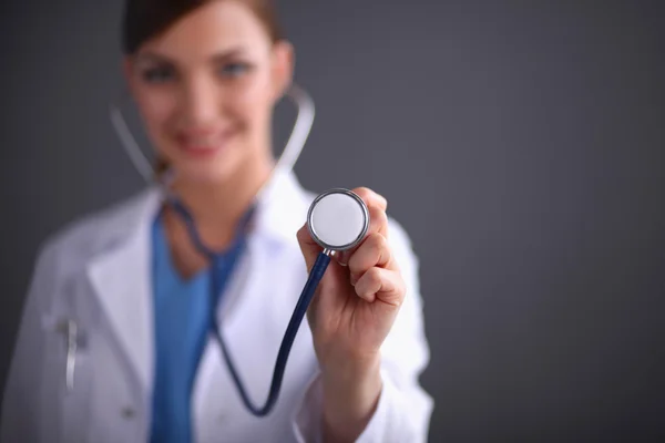 Doctor listening with a stethoscope, close-up, isolated on whit — Stock Photo, Image