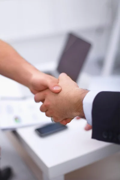 Business people handshake, sitting in the office — Stock Photo, Image