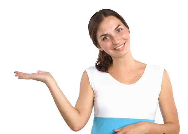 Portrait of a smiling young woman pointing up — Stock Photo, Image