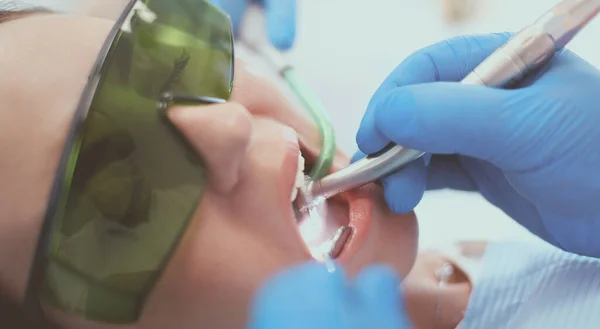 Dental team and patient at dentists surgery — Stock Photo, Image