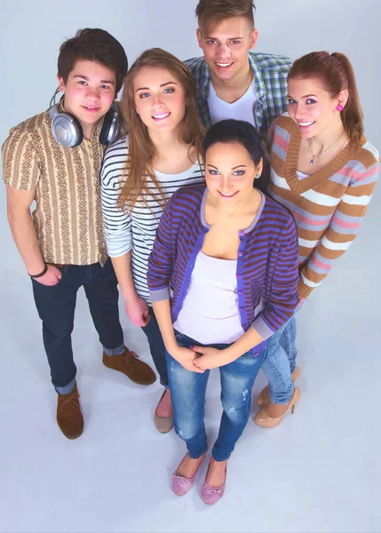 Grupo de estudantes felizes. Isolado sobre fundo branco . — Fotografia de Stock