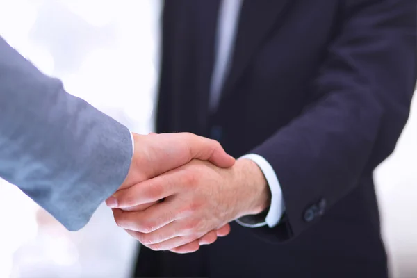 Businessmen shaking hands, isolated on white. — Stock Photo, Image