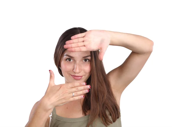 Jonge aantrekkelijke vrouw haar handen inlijsten — Stockfoto