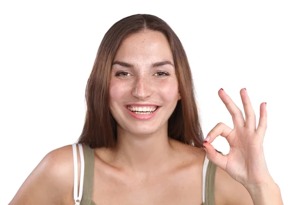 Young woman showing thumb up, isolated on white — Stock Photo, Image