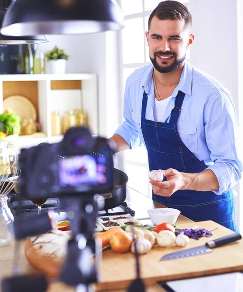 Man Holding Paper Bag Full Groceries Kitchen Background Shopping Healthy — Stock Photo, Image