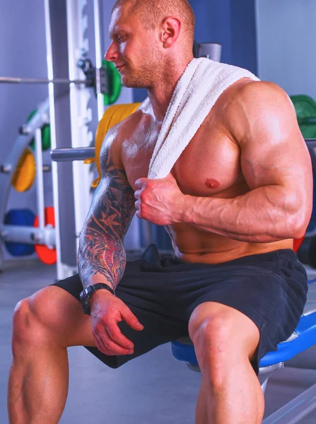 Young Handsome Man Sits Workout Gym — Stock Photo, Image