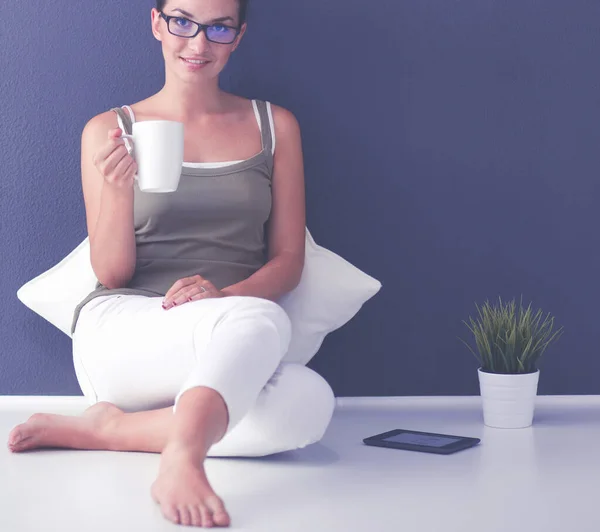 Attractive Young Woman Holding Cup Coffee Smiling While Sitting Floor — Stock Photo, Image