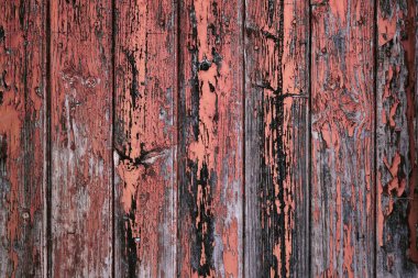 Mercan pembesi soyulmuş eski ahşap duvarlar, sıkıntılı kırsal arka plan ya da doku 