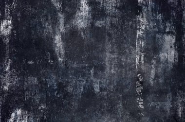 Dark distressed grunge textured background 