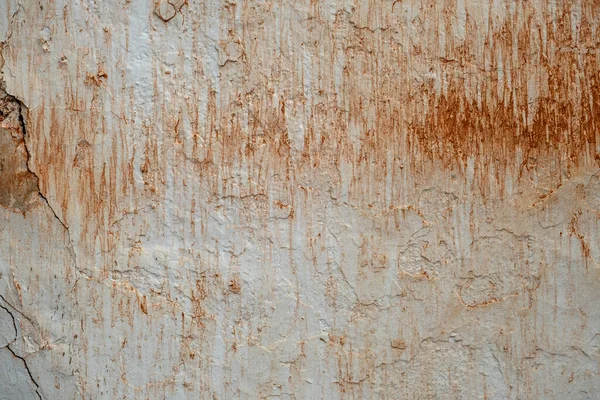 Old stained lime washed wall grunge background