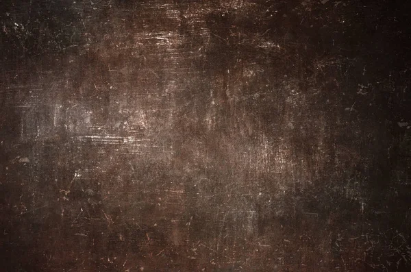 Old worn out metal backdrop grunge background or texture