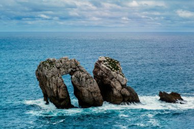 Sea gate O Canto del Diablo in the Broken Coast (Costa Quebrada), Cantabria, Spain