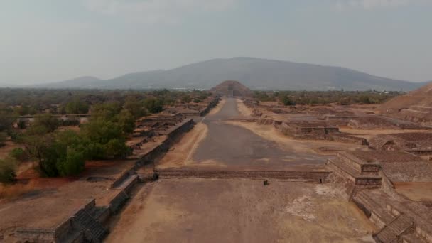 Low flight above archaeological site without people, heading to Pyramid of the moon.Ancient site with architecturally significant Mesoamerican pyramids, Teotihuacan, Mexico