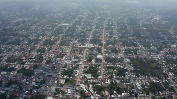 Aerial panoramic view of city with regular street network. Small square blocks of houses in pattern. Valladolid, Mexico — Stock Video