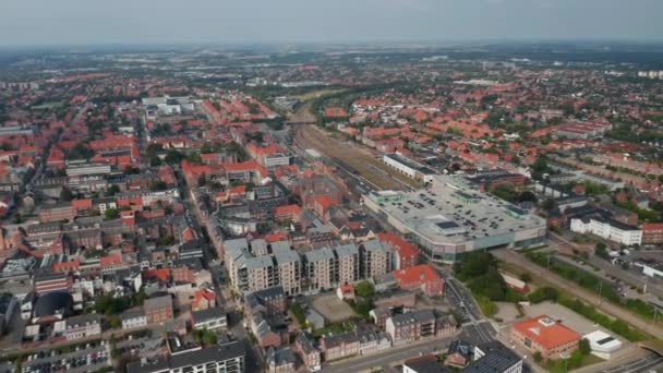 Aerial stunning view of Esbjerg, Denmark. Panning drone view over the characteristic brick buildings of one of the most important North Sea seaport — Stock Video