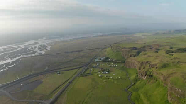 Breathtaking aerial view of highlands near Seljalandsfoss waterfall in southern Iceland. Birds eye drone view of icelandic countryside with seljalands river. Amazing in nature — Stock Video