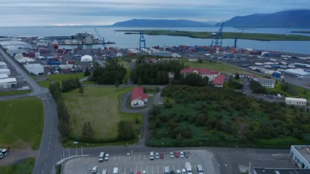 Drone view of Sundahofn cargo port in Reykjavik, Iceland. The coastal trading harbor is the largest in Iceland. Trading and commercial. Import and Export. Business concept — стоковое видео