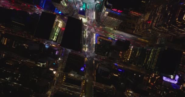 Aerial birds eye overhead top down view of streets and buildings at Times Square. Entertaining centre in night city. Manhattan, New York City, USA — Vídeo de Stock