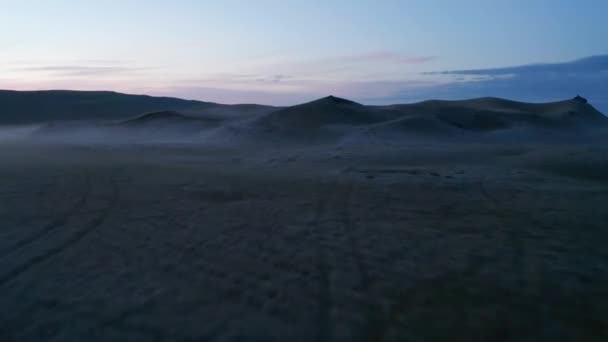 Low flight above ground mounds near road in evening Nordic countryside. Preserved Nordic nature. Iceland — Stock Video